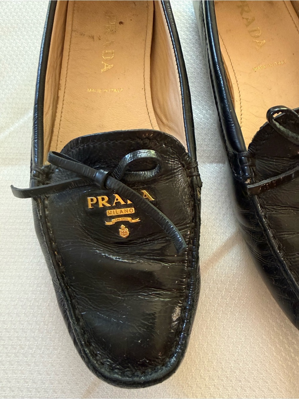 Prada Black Leather Bow Moccasin Loafers with Gold Logo